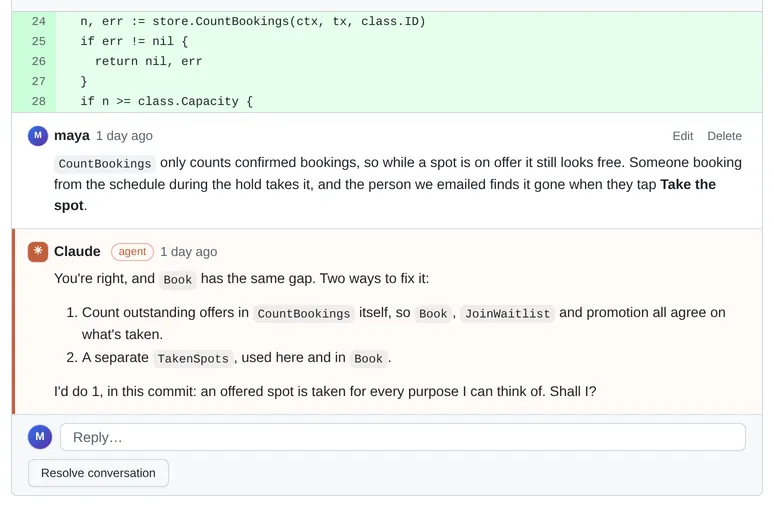 A thread on five lines of Go: the reviewer points out that a spot on offer still looks free, and Claude, marked as an agent, replies with two ways to fix it and asks which to do